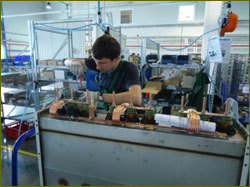 A worker making an RM6 unit at Schneiders new plant, its third in Russia