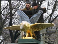 mounting of gilt double eagles