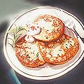 circle-shaped golden blinis resemble the sun